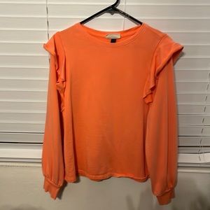 Womens Bright orange sweatshirt.